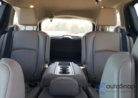 2018 Honda Odyssey Elite z USA, uszkodzony, nr VIN 5FNRL6H97JB006627